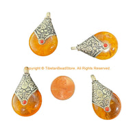 Reversible Tibetan Resin Amber Pendant with Tibetan Silver Caps, Repousse Lotus Flower Details & Bead Inlay Accent - WM7999-1