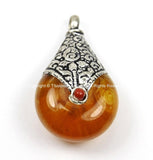 Reversible Tibetan Resin Amber Pendant with Tibetan Silver Caps, Repousse Lotus Flower Details & Bead Inlay Accent - WM7999-1