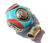 Tibetan Reversible Round Blue Copal Resin Pendant with Turquoise, Coral Inlays, Repousse Auspicious Conch & Vajra Details - Tibetan - WM6092