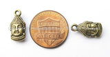 10 Pieces - Antiqued Brass Tone Reversible Buddha Face Charms - Small Antiqued Brass Tone Buddha Charms - Small Buddha Charms - WM5533-10 - TibetanBeadStore