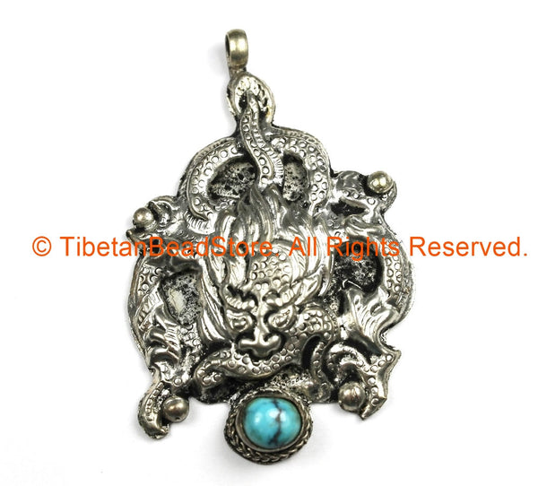 Ethnic Tribal Antique Look Repousse Tibetan Dragon Pendant with Turquoise Inlay - TibetanBeadStore - Handmade - Unisex Jewelry - WM7208