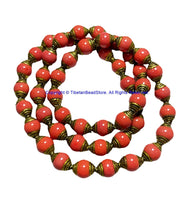2 BEADS - Tibetan Red Coral Beads with Handmade Repousse Brass Caps - Tibetan Beads - TibetanBeadStore - B1411C-2