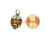 Ethnic Tibetan Old Carnelian Round Charm Pendant with Repousse Carved Tibetan Silver Floral Caps - WM7985L