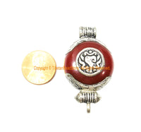 Small Ethnic Tibetan Red Resin Ghau Amulet Charm Pendant with Tibetan Silver Caps, Repousse Auspicious Conch & Bead Inlay Accent - WM7958