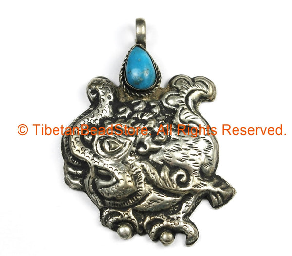 Ethnic Tribal Nepal Antique Look Repousse Tibetan Silver Guardian Deity Pendant with Turquoise Inlay - Nepal Tibet Jewelry - WM7205