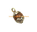 Ethnic Tibetan Old Carnelian Round Charm Pendant with Repousse Carved Tibetan Silver Floral Caps - WM7985H