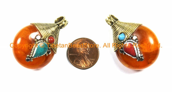 2 PENDANTS Reversible Ethnic Tibetan Amber Color Resin Pendants with Brass Wire Cap, White Metal, Turquoise & Coral Inlays - WM3749B-2