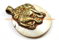 Ethnic Tribal Tibetan Naga Conch Shell Disc Pendant with Repousse Brass Monkey & Elephant Details - WM7178