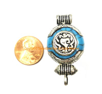 Small Ethnic Tibetan Blue Resin Ghau Amulet Charm Pendant with Tibetan Silver Caps, Repousse Auspicious Conch & Coral Inlay Accent - WM7959