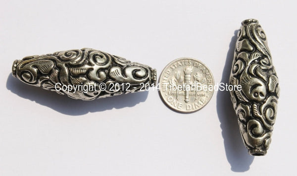 1 bead - Large Tibetan Silver Long Bicone Repousse Bead with Fish & Floral Details - 16mm x 43mm - B2150-1