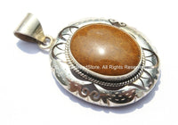 Tibetan Engraved Cut Round Pendant with Brown Jasper Inlay by TibetanBeadStore - Handmade Nepal Tibetan Jewelry - Tibetan Pendant - WM5215
